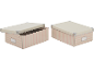 Zwei rosa-beige gestreifte Aufbewahrungsboxen mit Metallecken.