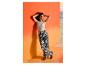 Frau in ESMARA® Wide-Leg-Hose und grauem Top vor Strandkulisse.