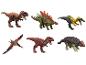 Sechs Dinosaurier-Spielzeuge, darunter ein T-Rex, Stegosaurus, Baryonyx, Pteranodon und Ankylosaurus.