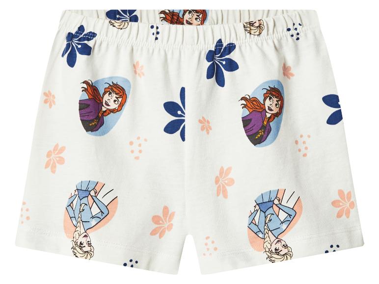 Weiße Mädchenshorts mit Zeichentrickfiguren und Blumenmuster.