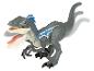 Eine graue Velociraptor Spielzeugfigur mit blauen Details.