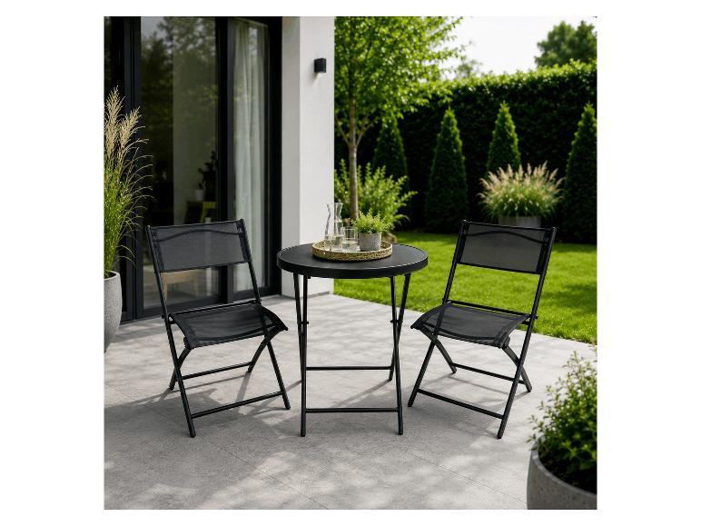 Schwarzes Bistrot-Set mit zwei Klappstühlen und einem runden Tisch auf einer Terrasse.
