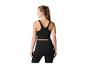 Frau in schwarzem Sport-Crop-Top und Leggings, Rückansicht