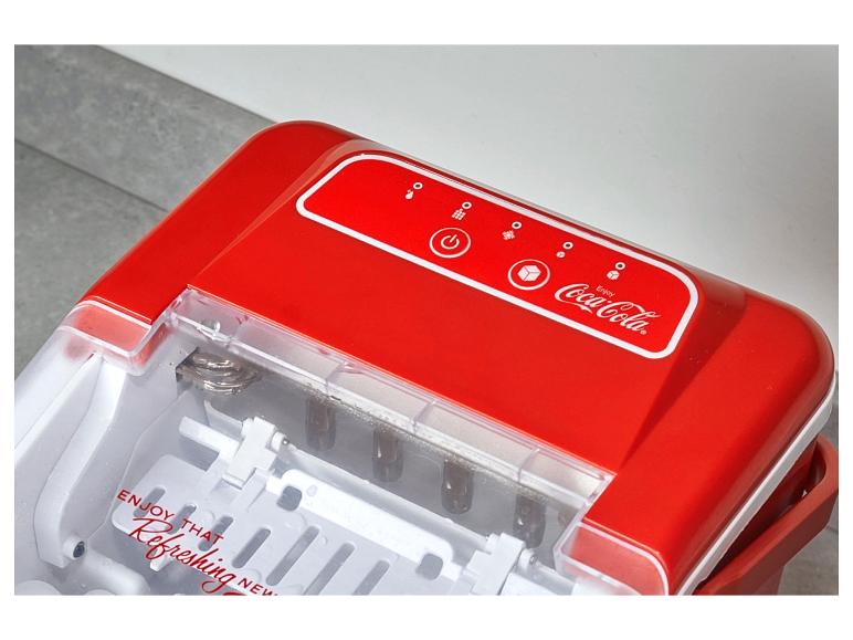 Ein roter Coca-Cola Eiswürfelbereiter mit Knöpfen für verschiedene Eiswürfelgrößen.