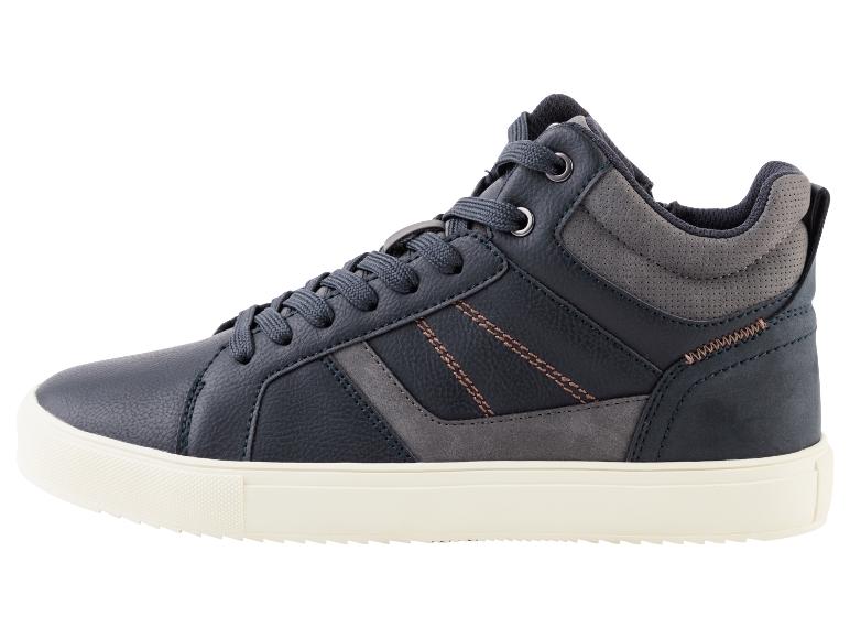 Ein dunkelblauer Sneaker mit weißer Sohle.
