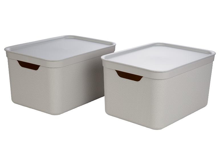 Zwei weiße Aufbewahrungsboxen mit Deckeln.