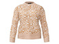 Ein beiger Pullover mit Leopardenmuster.