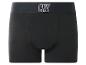 Schwarze Boxershorts mit weißem Logo am Bund.