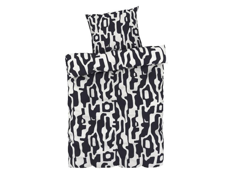 Eine Bettwäsche mit einem schwarzen und weißen abstrakten Muster.