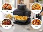 SILVERCREST® Glas-Heißluftfritteuse mit Beispielen für Gerichte: Pizza, Pommes, Steak und Wings.