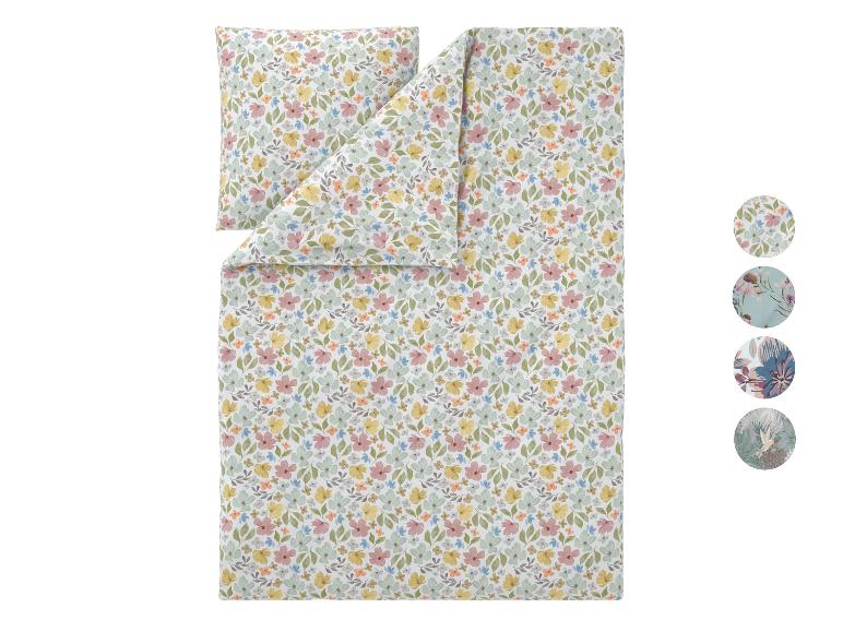 Blumiges Bettwäsche-Set mit Kissenbezug, mit pastellfarbenen Blumen und Blättern.