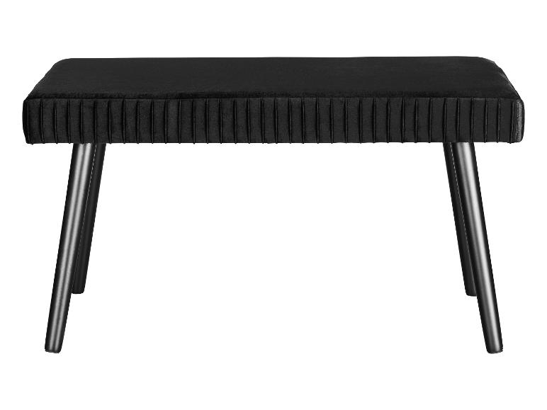 Eine schwarze Samtbank mit Holzbeinen.