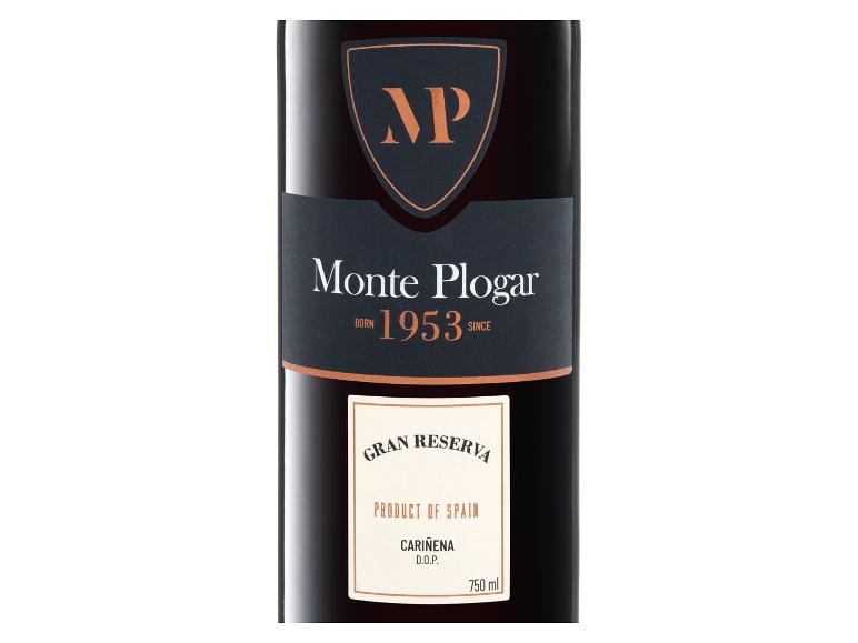 Rotweinflasche mit schwarzem und orangefarbenem Etikett, das Gran Reserva aus Cariñena, Spanien, anzeigt.