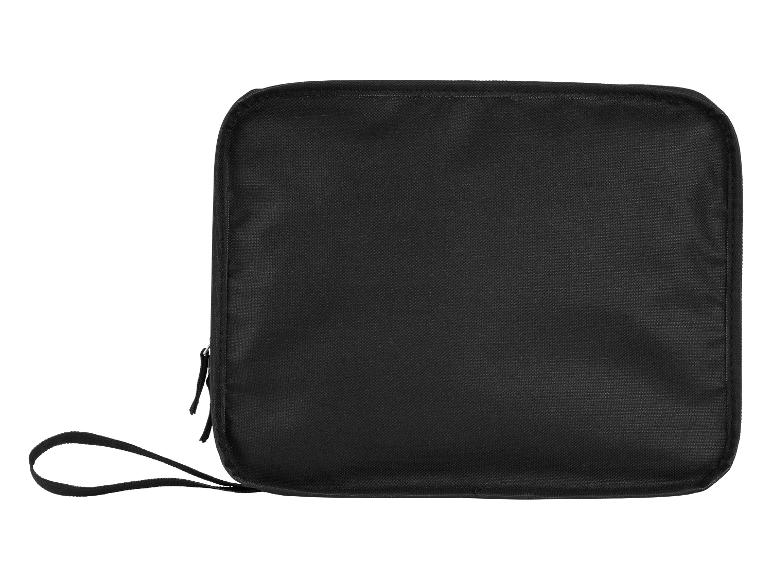 Eine schwarze Kosmetiktasche mit Griff.