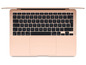 Ein rosa Apple Laptop mit schwarzer Tastatur