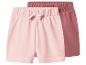Zwei Baby-Shorts in Rosa und Dunkelrosa mit Gummizug und Schleife.