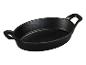 Schwarze, ovale Gusseisenpfanne mit zwei Griffen.