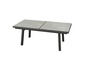 Ein grauer Esstisch mit ausziehbarem Tischblatt und schwarzen Beinen.