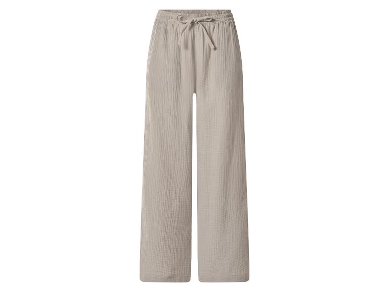 Beige weite Musselin-Hose mit elastischem Bund und Kordelzug.