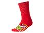 Rote Socken mit einer grünen Zeichentrickfigur und gelben und weißen Streifen.