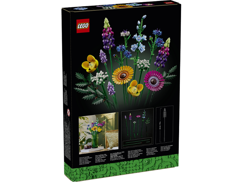 Bunter Blumenstrauß aus Bausteinen auf schwarzem Hintergrund, Vase nicht enthalten.
