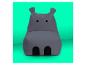 Ein grauer, hippopotamusförmiger Sitzsack für Kinder.