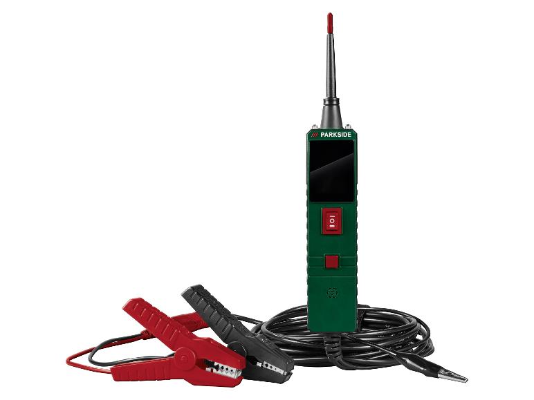 Ein grüner und schwarzer elektrischer Stromkreistester mit roten und schwarzen Klemmen, auf weißem Hintergrund.