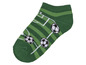 Grüne Socken mit Fußball-Motiv.