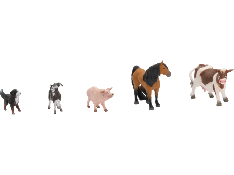 Spielzeugtiere: Hund, Ziege, Schwein, Pferd und Kuh.