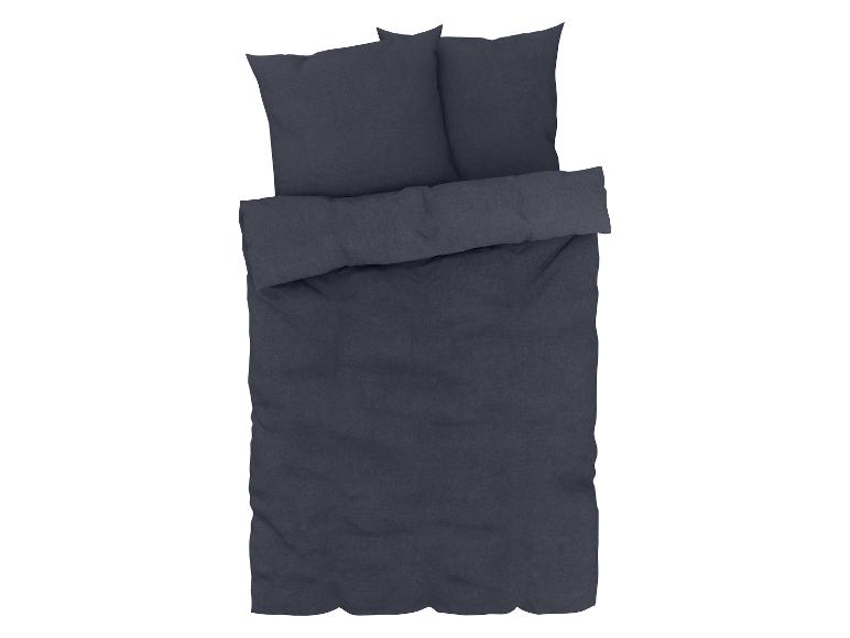 Dunkelblaue Bettwäsche: Bettbezug und Kissenbezüge.