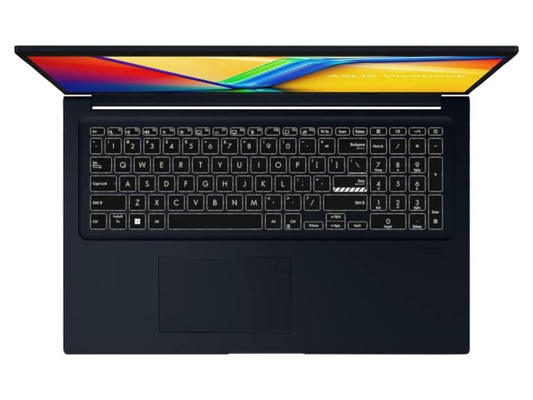 Ein offenes Laptop mit einem Bildschirm, der lebendige Farben zeigt, und einer beleuchteten Tastatur.