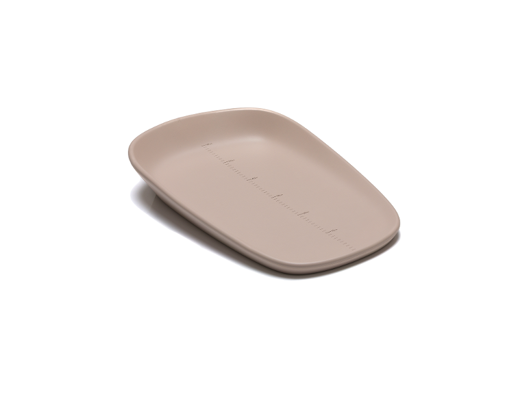 Beige Wickelauflage mit Maßen von 10cm bis 60cm.