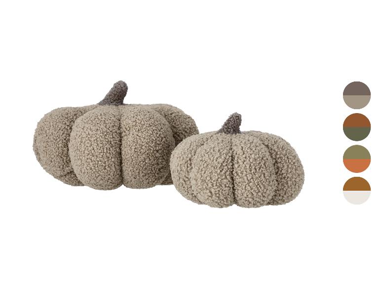 Zwei weiche, beige Dekokürbisse mit braunen Stielen und einer Farbpalette.