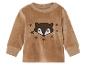 Brauner Baby-Pullover mit langen Ärmeln, Fuchs- und Sternmotiv.