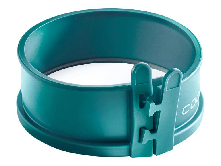 Eine teal farbige Springform mit einem herausnehmbaren Boden