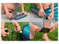 Vorbereitung eines Hydro-Force SUP Boards: Finne, Paddel und Leash.