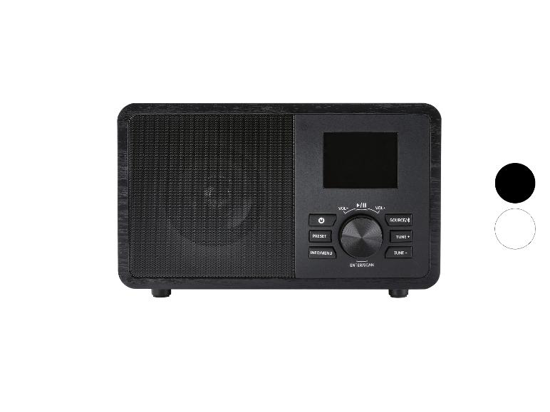 Schwarzes Retro-Radio mit Holzoptik und digitalem Display.