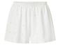 Weiße Damen-Shorts mit Lochstickerei und elastischem Bund.