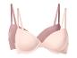 Zwei BHs in Rosa und Beige.