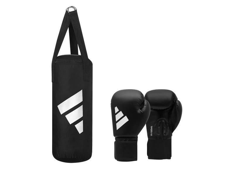 Ein schwarzer Adidas Boxsack und Boxhandschuhe.