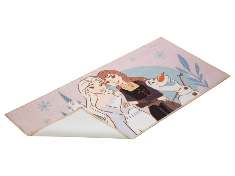 Ein rosa Teppich mit Elsa, Anna und Olaf aus Frozen.