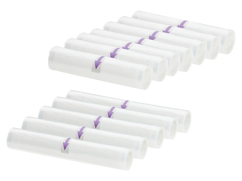 Zwei Reihen weißer Vakuumierrollen mit lila Pfeilmarkierungen.