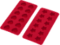 Rote Silikonform mit Herz- und Sternformen.