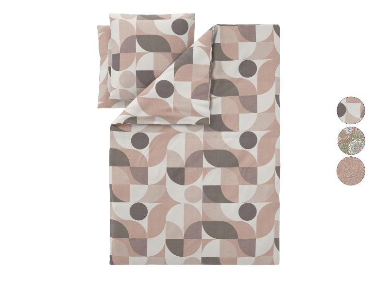Bettwäsche-Set mit Kissen, geometrisches Muster in Rosa- und Grautönen.