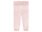 Rosa gestreifte Baby-Leggings.