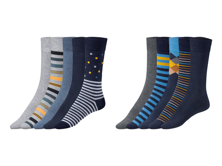 Zehn Socken in verschiedenen Streifen- und Punkte-Mustern.
