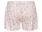 Kurze Hose mit rosafarbenem Blumenmuster.
