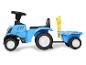Blauer New Holland Kindertraktor mit Anhänger.