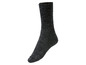 Ein Paar schwarze Wollsocken.