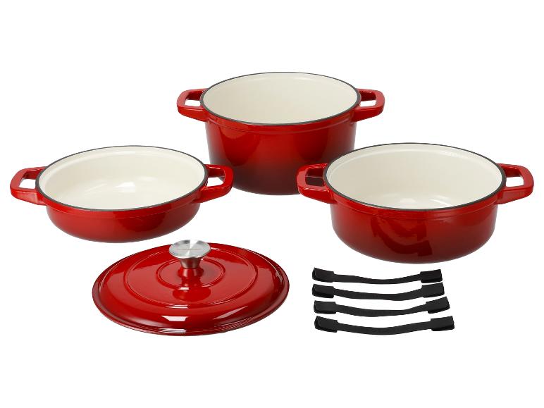 Roter gusseiserner Topf-Set von Staub.